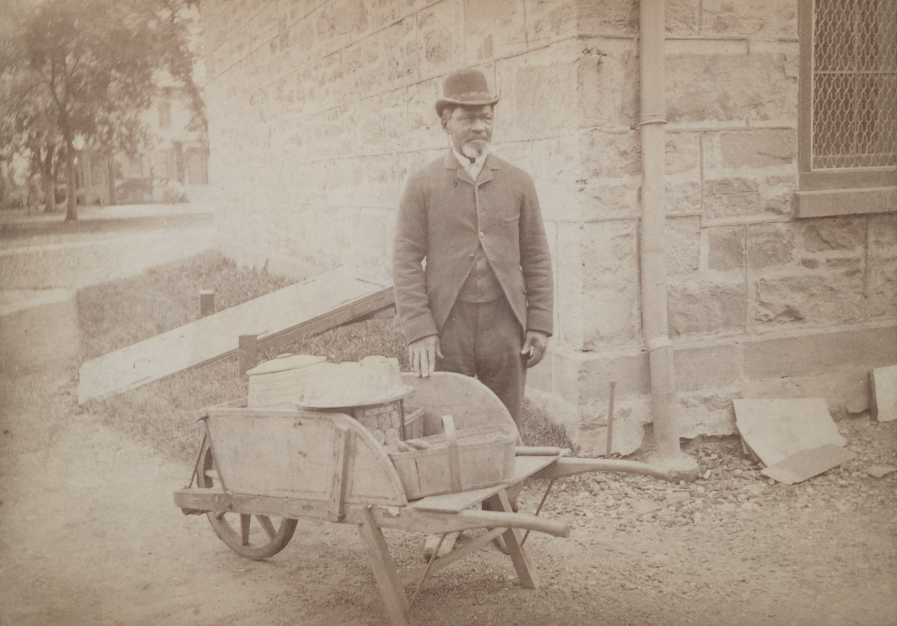 James C. Johnson with wheelbarrow